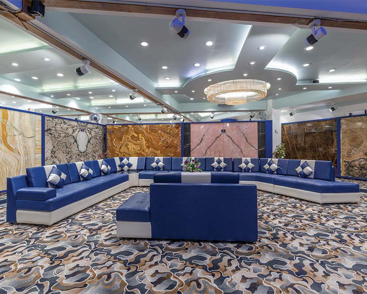 A beautiful marble showroom with couch